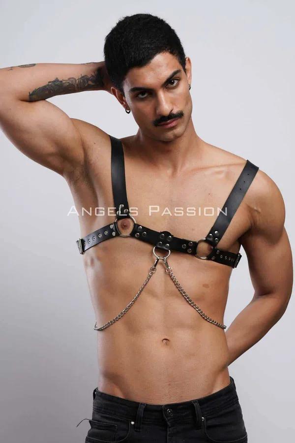 black faux leather o-ring chest harness with detachable silver chain worn by male model front view